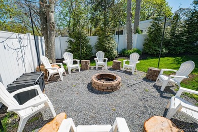 Ideally situated in the heart of Hampton Bays with walk-to- town - photo 12