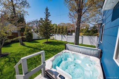Ideally situated in the heart of Hampton Bays with walk-to- town - photo 14