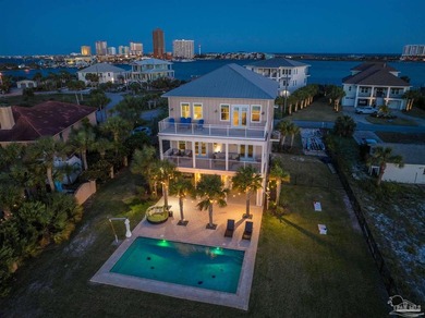 Experience waterfront luxury living in this magnificent coastal - photo 1