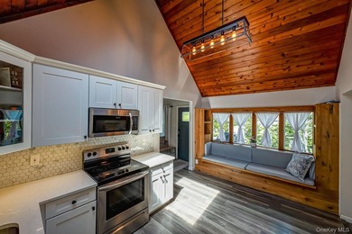Ideally situated in the heart of Hampton Bays with walk-to- town - photo 22