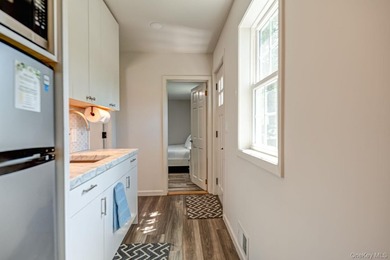 Ideally situated in the heart of Hampton Bays with walk-to- town - photo 35