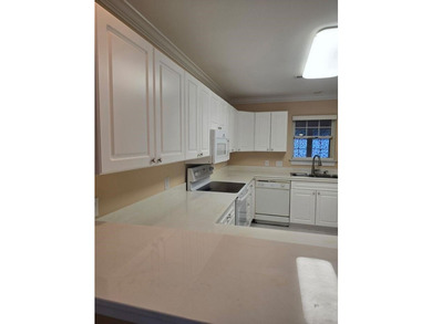 Beautifully maintained 3-bedroom, 2-bath corner-unit townhome in - photo 11