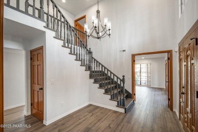 This beautifully remodeled 2-story brick and stucco home blends