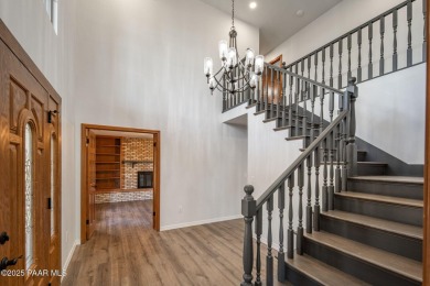 This beautifully remodeled 2-story brick and stucco home blends