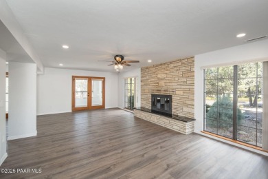 This beautifully remodeled 2-story brick and stucco home blends