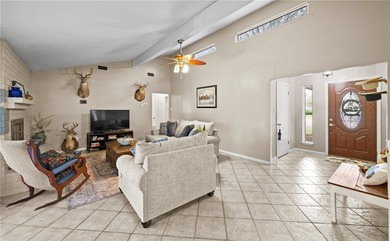 This 3-bed, 2-bath brick home sits on a large corner lot in an - photo 3