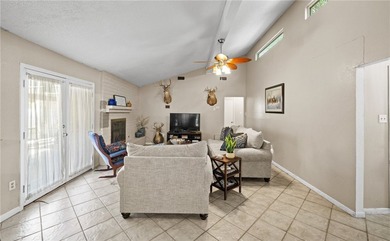 This 3-bed, 2-bath brick home sits on a large corner lot in an - photo 4