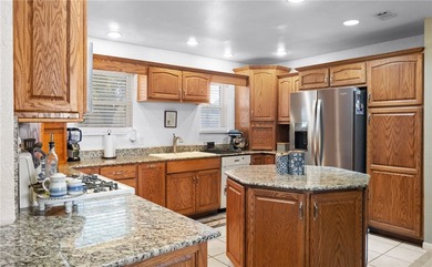 This 3-bed, 2-bath brick home sits on a large corner lot in an - photo 7