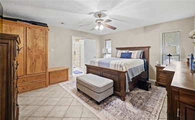 This 3-bed, 2-bath brick home sits on a large corner lot in an - photo 10