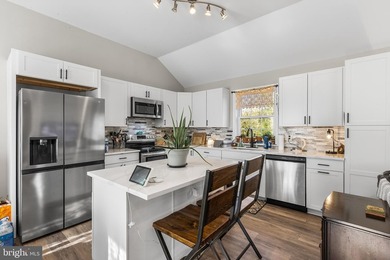 Welcome to this TURNKEY RAISED RANCH home with mountain and - photo 3