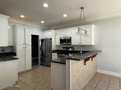 Welcome to this lovely 3 bedroom and 3 full bath home in - photo 12