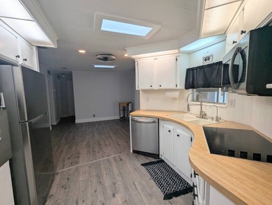 This move-in ready, fully remodeled, partially furnished - photo 12