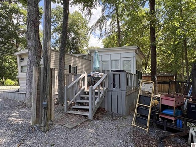 Corner lot; .8 accre with older manufacture home. Front Porch; - photo 12