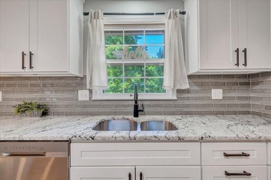 Welcome to this beautifully updated ranch home located in the - photo 28