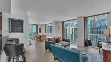 A must-see corner residence at Vizcayne Condominium featuring