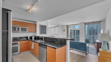 A must-see corner residence at Vizcayne Condominium featuring