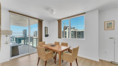 A must-see corner residence at Vizcayne Condominium featuring