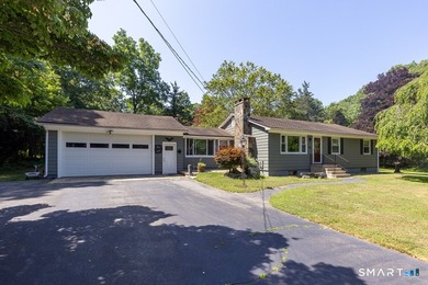 Nestled on more than 1.4 private acres, this sprawling ranch - photo 29
