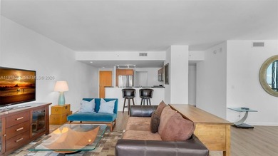 A must-see corner residence at Vizcayne Condominium featuring