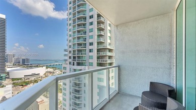 A must-see corner residence at Vizcayne Condominium featuring