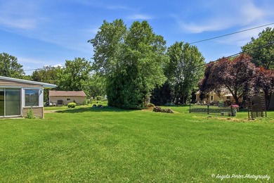 Most homes on this stretch of McHenry look out at the Fox River - photo 32