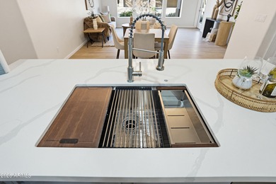 Beautifully upgraded unit located in a gated luxury condominium