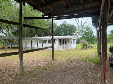 Charming home in Sandia just minutes from the lake! This - photo 3