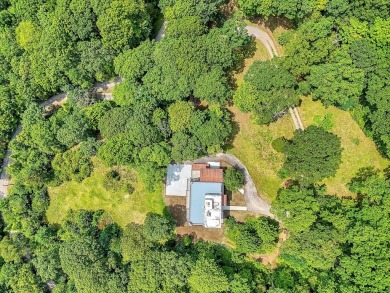 Your mountain top fortress awaits with this rare find in the