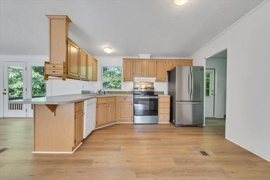 Come home to this beautifully renovated 3BR/2BA retreat nestled - photo 12