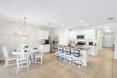 Experience the best of Florida living in the lovely gated - photo 11