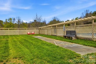 This highly coveted lower-level end unit in the Cloisters - photo 21
