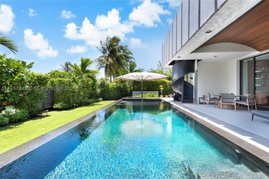 Located within a 24/7 guarded waterfront enclave and less than - photo 12