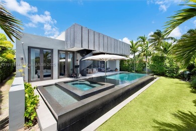 Located within a 24/7 guarded waterfront enclave and less than - photo 13