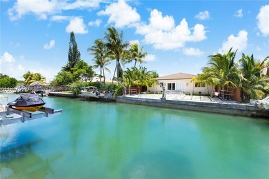 Located within a 24/7 guarded waterfront enclave and less than - photo 16