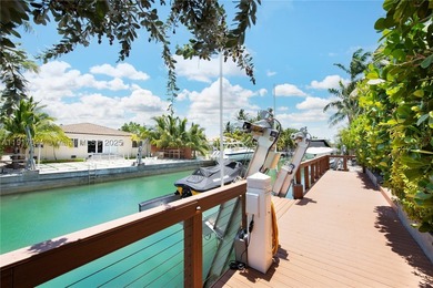 Located within a 24/7 guarded waterfront enclave and less than - photo 17