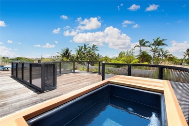 Located within a 24/7 guarded waterfront enclave and less than - photo 20