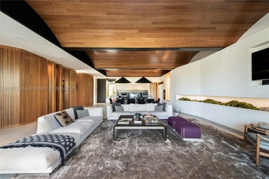 Located within a 24/7 guarded waterfront enclave and less than - photo 21