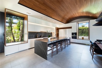 Located within a 24/7 guarded waterfront enclave and less than - photo 24