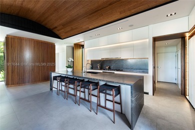 Located within a 24/7 guarded waterfront enclave and less than - photo 25