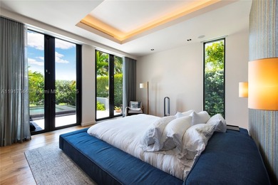 Located within a 24/7 guarded waterfront enclave and less than - photo 28