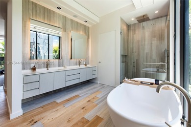 Located within a 24/7 guarded waterfront enclave and less than - photo 30