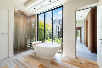 Located within a 24/7 guarded waterfront enclave and less than - photo 31