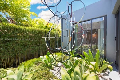Located within a 24/7 guarded waterfront enclave and less than - photo 32