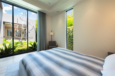 Located within a 24/7 guarded waterfront enclave and less than - photo 34