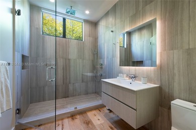 Located within a 24/7 guarded waterfront enclave and less than - photo 35