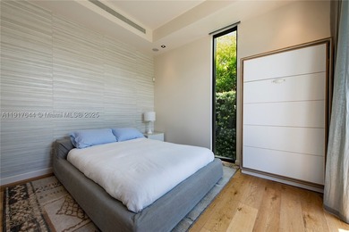 Located within a 24/7 guarded waterfront enclave and less than - photo 36