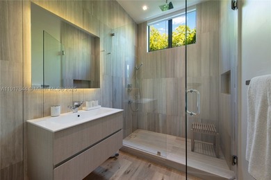 Located within a 24/7 guarded waterfront enclave and less than - photo 37