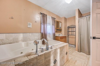 Unique Pocono Style Ranch Home! Offering A Versatile Floor Plan