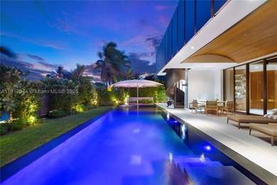 Located within a 24/7 guarded waterfront enclave and less than - photo 48