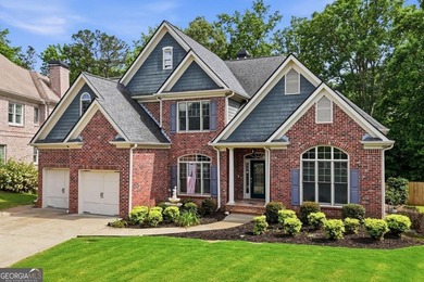 You will love this 6-bedroom home with the primary suite on the - photo 3